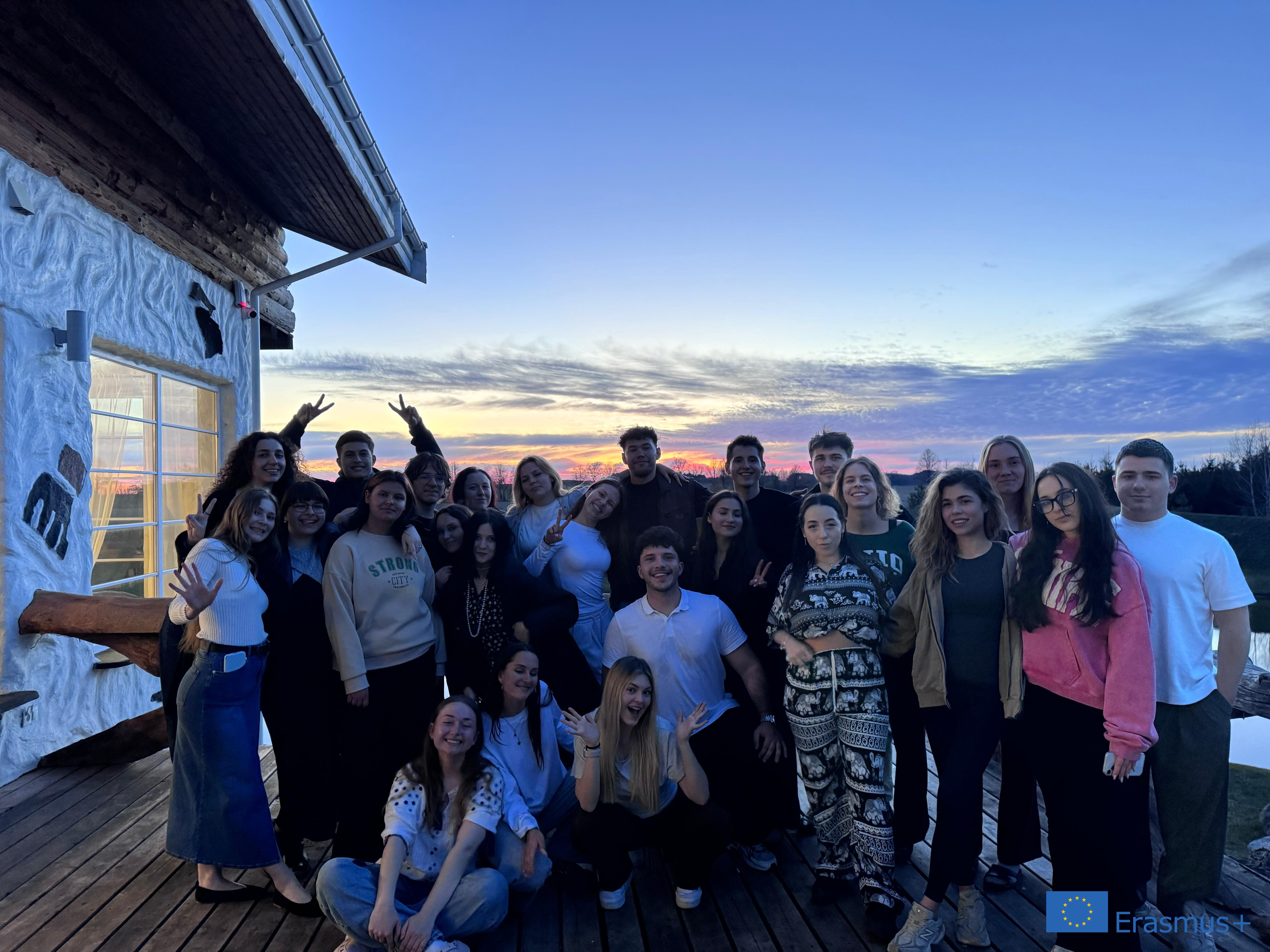 Group photo at sunset at the venue in Lithuania